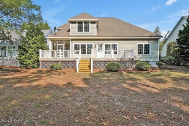 This thoughtfully designed home offers tranquil views of the on Members Club At St. James Plantation in North Carolina - for sale on GolfHomes.com, golf home, golf lot