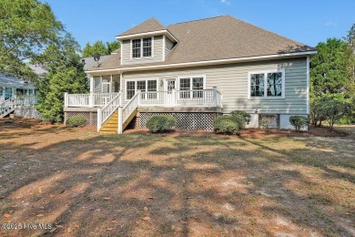 This thoughtfully designed home offers tranquil views of the on Members Club At St. James Plantation in North Carolina - for sale on GolfHomes.com, golf home, golf lot