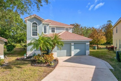 This light-filled home boasts beautiful views from the side of on Tuscawilla Country Club in Florida - for sale on GolfHomes.com, golf home, golf lot