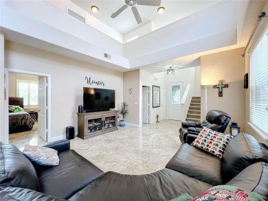 This light-filled home boasts beautiful views from the side of on Tuscawilla Country Club in Florida - for sale on GolfHomes.com, golf home, golf lot