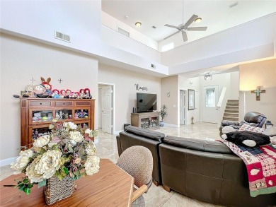 This light-filled home boasts beautiful views from the side of on Tuscawilla Country Club in Florida - for sale on GolfHomes.com, golf home, golf lot