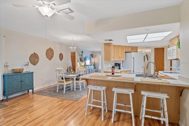 Two homes for the price of one!  This charming Venice retreat on Jacaranda West Country Club in Florida - for sale on GolfHomes.com, golf home, golf lot