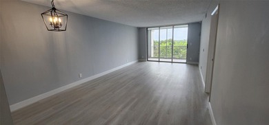 Spacious Remodel Experience the perfect blend of comfort on Palm-Aire Country Club and Resort - Palms in Florida - for sale on GolfHomes.com, golf home, golf lot