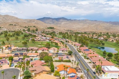 Welcome to your new desert oasis! This stunning 3-bedroom on Mission Lakes Country Club in California - for sale on GolfHomes.com, golf home, golf lot