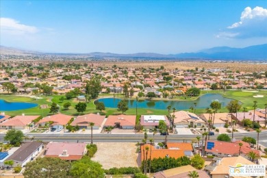 Welcome to your new desert oasis! This stunning 3-bedroom on Mission Lakes Country Club in California - for sale on GolfHomes.com, golf home, golf lot