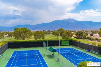 Welcome to your new desert oasis! This stunning 3-bedroom on Mission Lakes Country Club in California - for sale on GolfHomes.com, golf home, golf lot