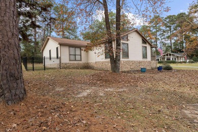 Wake up to lake life done right at this 2 bed, 2 bath home near on Rayburn Country Club in Texas - for sale on GolfHomes.com, golf home, golf lot