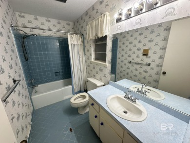 Spacious Gulf Shores Classic with Endless Potential! Discover on The Golf Club of the Wharf in Alabama - for sale on GolfHomes.com, golf home, golf lot