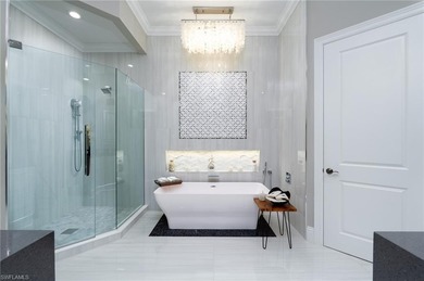 Discover elevated coastal living in this stunning second-floor on Miromar Lakes Golf Club in Florida - for sale on GolfHomes.com, golf home, golf lot