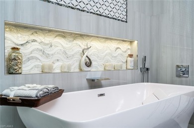 Discover elevated coastal living in this stunning second-floor on Miromar Lakes Golf Club in Florida - for sale on GolfHomes.com, golf home, golf lot