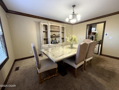 Welcome to this beautifully maintained 1.5-story home with a on Briarbrook Golf Course in Missouri - for sale on GolfHomes.com, golf home, golf lot