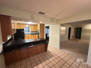 Spacious Gulf Shores Classic with Endless Potential! Discover on The Golf Club of the Wharf in Alabama - for sale on GolfHomes.com, golf home, golf lot
