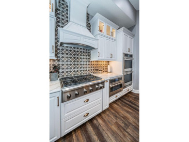 Welcome to your dream home, a stunning 4 BR, 3 bath luxury on Seven Springs Golf and Country Club in Florida - for sale on GolfHomes.com, golf home, golf lot