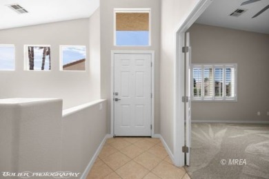 This COMPLETELY RENOVATED townhome is located in Sunset Greens on CasaBlanca Resort and Casino in Nevada - for sale on GolfHomes.com, golf home, golf lot