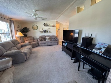 Looking for the perfect getaway in sunny Florida? Look no on Lake Henry Golf Club in Florida - for sale on GolfHomes.com, golf home, golf lot