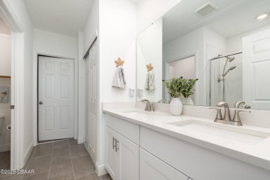 Better than new! Waterfront! This 4/2.5 stunning home with a on LPGA International Golf Course in Florida - for sale on GolfHomes.com, golf home, golf lot
