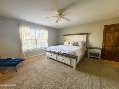 Welcome to this beautifully maintained 1.5-story home with a on Briarbrook Golf Course in Missouri - for sale on GolfHomes.com, golf home, golf lot