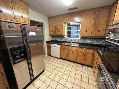 Spacious Gulf Shores Classic with Endless Potential! Discover on The Golf Club of the Wharf in Alabama - for sale on GolfHomes.com, golf home, golf lot
