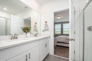 Better than new! Waterfront! This 4/2.5 stunning home with a on LPGA International Golf Course in Florida - for sale on GolfHomes.com, golf home, golf lot