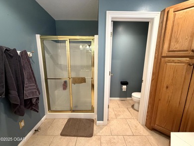 Welcome to this beautifully maintained 1.5-story home with a on Briarbrook Golf Course in Missouri - for sale on GolfHomes.com, golf home, golf lot