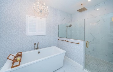 Welcome to your dream home, a stunning 4 BR, 3 bath luxury on Seven Springs Golf and Country Club in Florida - for sale on GolfHomes.com, golf home, golf lot
