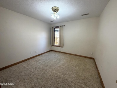 Welcome to this beautifully maintained 1.5-story home with a on Briarbrook Golf Course in Missouri - for sale on GolfHomes.com, golf home, golf lot