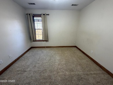 Welcome to this beautifully maintained 1.5-story home with a on Briarbrook Golf Course in Missouri - for sale on GolfHomes.com, golf home, golf lot