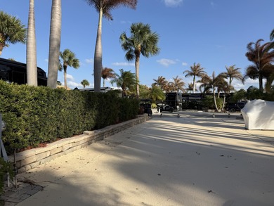 Huge lot in the MCRSLW Resort that backs to golf course. Mature on Motorcoach Resort Golf Course in Florida - for sale on GolfHomes.com, golf home, golf lot