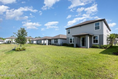 Better than new! Waterfront! This 4/2.5 stunning home with a on LPGA International Golf Course in Florida - for sale on GolfHomes.com, golf home, golf lot