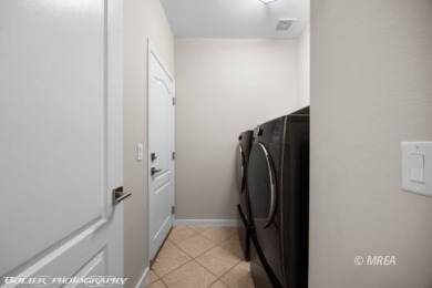 This COMPLETELY RENOVATED townhome is located in Sunset Greens on CasaBlanca Resort and Casino in Nevada - for sale on GolfHomes.com, golf home, golf lot