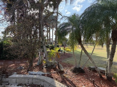 Huge lot in the MCRSLW Resort that backs to golf course. Mature on Motorcoach Resort Golf Course in Florida - for sale on GolfHomes.com, golf home, golf lot