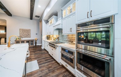 Welcome to your dream home, a stunning 4 BR, 3 bath luxury on Seven Springs Golf and Country Club in Florida - for sale on GolfHomes.com, golf home, golf lot