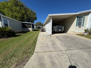 Looking for the perfect getaway in sunny Florida? Look no on Lake Henry Golf Club in Florida - for sale on GolfHomes.com, golf home, golf lot