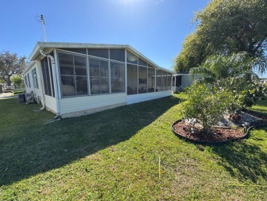 Looking for the perfect getaway in sunny Florida? Look no on Lake Henry Golf Club in Florida - for sale on GolfHomes.com, golf home, golf lot