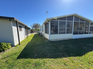 Looking for the perfect getaway in sunny Florida? Look no on Lake Henry Golf Club in Florida - for sale on GolfHomes.com, golf home, golf lot