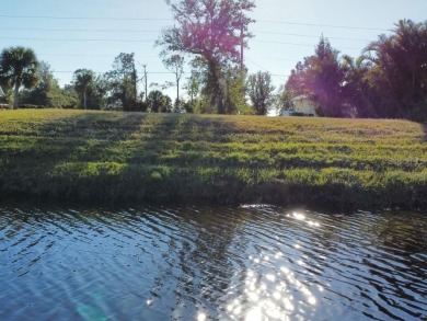 PREMIUM waterfront canal lot with NO flood zone insurance on Pinemoor West Golf Club in Florida - for sale on GolfHomes.com, golf home, golf lot