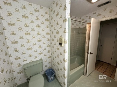 Spacious Gulf Shores Classic with Endless Potential! Discover on The Golf Club of the Wharf in Alabama - for sale on GolfHomes.com, golf home, golf lot