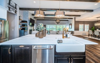 Welcome to your dream home, a stunning 4 BR, 3 bath luxury on Seven Springs Golf and Country Club in Florida - for sale on GolfHomes.com, golf home, golf lot