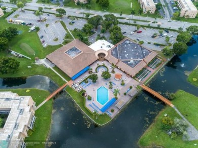 PRICE REDUCED! Welcome to your new home in the heart of a serene on Sunrise Lakes Phase III in Florida - for sale on GolfHomes.com, golf home, golf lot