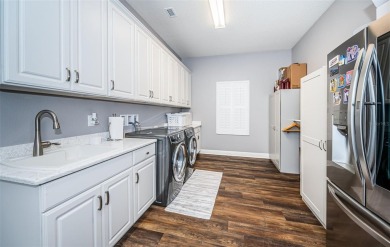 Welcome to your dream home, a stunning 4 BR, 3 bath luxury on Seven Springs Golf and Country Club in Florida - for sale on GolfHomes.com, golf home, golf lot
