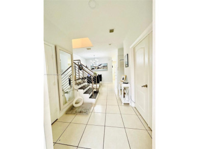 Beautiful and remodeled townhouse with 4 bedrooms and 3 full on Country Club of Miami in Florida - for sale on GolfHomes.com, golf home, golf lot