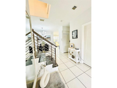 Beautiful and remodeled townhouse with 4 bedrooms and 3 full on Country Club of Miami in Florida - for sale on GolfHomes.com, golf home, golf lot