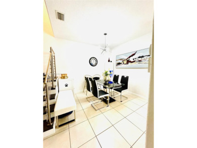 Beautiful and remodeled townhouse with 4 bedrooms and 3 full on Country Club of Miami in Florida - for sale on GolfHomes.com, golf home, golf lot