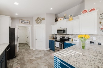 This stunning 4 bed, 2 bath home sits on a  1-acre corner lot on Spring Creek Golf Course in Nevada - for sale on GolfHomes.com, golf home, golf lot