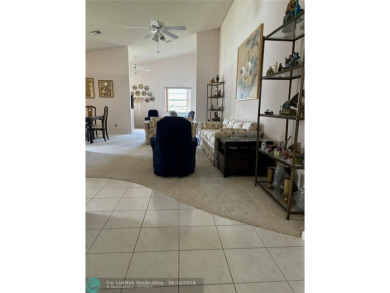 Free standing single family Waterfront home in the gated on Cypress Lakes Golf Course - West Palm Beach in Florida - for sale on GolfHomes.com, golf home, golf lot