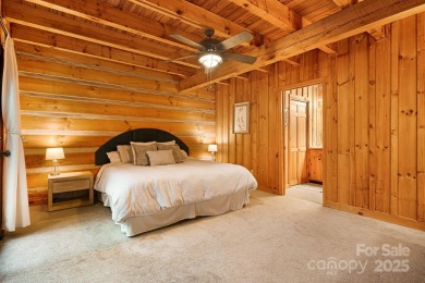 Prepare to fall in love with this beautifully updated mountain on Wolf Laurel Country Club in North Carolina - for sale on GolfHomes.com, golf home, golf lot