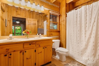 Prepare to fall in love with this beautifully updated mountain on Wolf Laurel Country Club in North Carolina - for sale on GolfHomes.com, golf home, golf lot