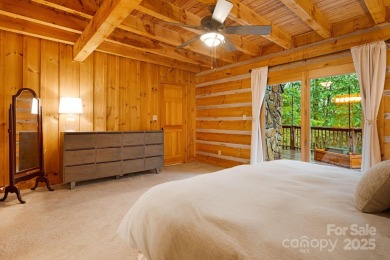 Prepare to fall in love with this beautifully updated mountain on Wolf Laurel Country Club in North Carolina - for sale on GolfHomes.com, golf home, golf lot