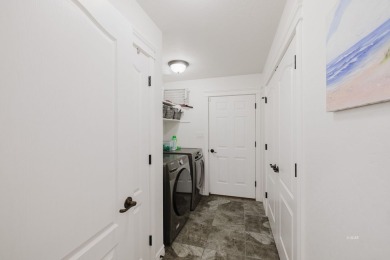 This stunning 4 bed, 2 bath home sits on a  1-acre corner lot on Spring Creek Golf Course in Nevada - for sale on GolfHomes.com, golf home, golf lot