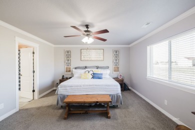 This stunning 4 bed, 2 bath home sits on a  1-acre corner lot on Spring Creek Golf Course in Nevada - for sale on GolfHomes.com, golf home, golf lot